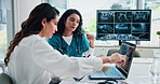 Laptop, people and meeting for healthcare treatment, mentor and surgery internship. Medical intern, discussion and online for brainstorming diagnosis, paperwork and website for orthopedics plan