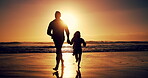 Silhouette, father and child run with sunset for beach fun, bonding together and summer vacation. Family, holding hands and energy with playful games, tropical holiday and exploring for getaway trip