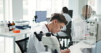 Science, laboratory and research with man, notes and microscope data analysis for report. Biotechnology, scientist and medical journal study with feedback and professional with healthcare article
