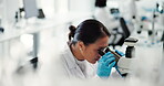 Lab, scientist and woman with microscope, particles and medical research for breakthrough with tech. Healthcare, serious and person with equipment for science, examination and diagnosis of diseases