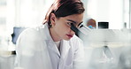 Science, lab and woman with microscope for research, medical study and discovery for medicine. Healthcare, pharmaceutical and scientist with equipment for virus vaccine, microbiology and experiment