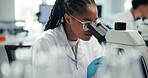 Microscope, lab and woman with glasses, medical research and analysis for breakthrough, virus or tech. Scientist, serious and person with equipment for science, examination and diagnosis of diseases