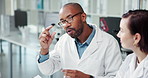 Group, research and scientist in laboratory with explanation for science, medical study or investigation. Healthcare, pharmaceutical study and people with dna test, rna analysis and communication