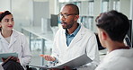 Man, meeting and doctors with documents, discussion and research report with planning for virus. Person, speaker and team with paperwork, tech and medical strategy with leader for wellness at clinic