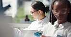 Scientist, women and research team in lab with documents, review and pharmaceutical study with computer. People, feedback and medical report with vaccine development, innovation or talking in montage