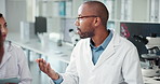 Scientist, team and man discussion in lab, research and review for progress, drugs and pharmaceutical company. People, talking and speaker with info for medical project with vaccine development