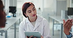 Discussion, tablet and group of scientists in laboratory for medical research, experiment or test. Collaboration, digital technology and team of biology students studying for pharmaceutical exam.