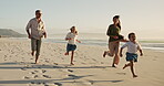 Parents, kids and run for fun on beach with racing game, energy and bonding of summer vacation. Family, children and playful with ocean activity, tropical holiday and travel adventure of getaway trip