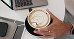 Latte art, laptop and hands of person in cafe with cup for lunch break, remote work and beverage. Cafeteria, freelance and above of espresso with closeup of customer in coffee shop for hospitality