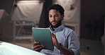 Tablet, relax and man in office at night for global PR release for magazine agency publication. Digital technology, overtime and male creative editor working on deadline for business website.