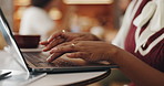 Hands, entrepreneur or woman on laptop in cafe for small business review, ratings or hospitality task. Restaurant schedule, online and coffee shop budget with closeup for profit, research or feedback