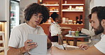 Coffee shop, tablet and business men in meeting, discussion and talking for online project. Restaurant, teamwork and people on digital tech for web design, research and website branding in cafe