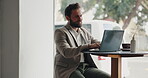 Laptop, typing and remote work with man in cafe for hospitality manager, research and reading. Digital, freelancer and restaurant with business person in coffee shop for planning, web and email