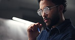 Man, designer and drawing at night, thinking or editing process for creativity, perspective and workshop. Person, sketch and review for results, pencil and project management in studio at agency