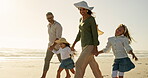 Parents, kids and walk by holding hands at beach for summer vacation, travel trip and bonding together. Family, children and security on ocean of holiday getaway, weekend journey and nature adventure