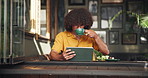 Coffee shop, student and man on tablet with drink for online project, digital learning and research. University, restaurant and person on tech for website, internet search and studying in cafe
