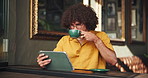 Cafe, student and man on tablet with coffee for online project, digital learning and research for assignment. University, restaurant and person on tech for website, internet search and studying