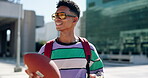 Football, thinking and walking with man on college campus for sports scholarship, education and future. Happy, university and gen z with person and vision in city for knowledge, academy and idea