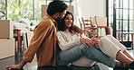 Couple, relocation and moving boxes in home, hug and property investment or real estate mortgage. People embrace, cardboard package and owners of new house, conversation and residential achievement