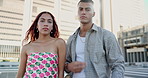 Friends, people and fashion with confidence for urban style, campaign and streetwear. Man, woman and gen z with buildings for trendy clothes, confidence and cool face for solidarity in New York