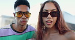 Friends, people and fashion with attitude for urban style, campaign and streetwear. Man, woman and gen z stylist with sunglasses for eyewear with trendy clothes, confidence and cool face in New York