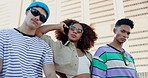 People, friends or fashion with sunglasses in city for casual or urban style clothing together. Portrait, group or students posing with cool outfit or shade for summer, funk or stylish design in town