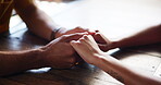 Couple, cafe table and holding hands for care in relationship, support and affection for bonding. Restaurant, touch and security in connection, marriage partnership and fingers for dating romance