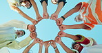 Circle, group and people with fist bump for teamwork, collaboration or solidarity below outdoor. Friends, cooperation and students hands together for support, happy or goal motivation with blue sky