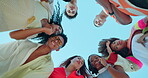 Circle, face and group of friends outdoor on blue sky from below together for bonding or unity. Diversity, huddle or summer and happy people having fun with community, social or team building