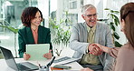 Business people, meeting or handshake with interview for corporate hiring, partnership or b2b at office. Group, team or employees shaking hands with thank you for agreement or recruiting at workplace