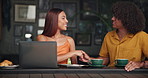 Students, cafe and people on laptop with handshake for assignment, group project and assessment. Coffee shop, restaurant and man and woman greeting on computer for studying, university and learning