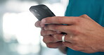 Closeup, hands and typing with smartphone for chat, online communication and connection with contact. Office, person and technology with mobile for application, consultant and networking with client