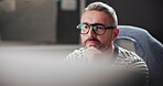 Business, creative and man with computer, thinking and copywriter with ideas for project and article. Glasses, copywriting and mature person with tech for blog, contemplating and thoughtful for task