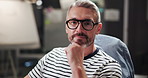 Face, business and man in studio, illustrator and graphic designer with glasses. Portrait, person and employee in modern office, artistic and project development with eyewear, thoughtful and wonder