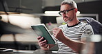 Business, tablet and man in office, planning and decision with internet, thinking and choice. Person, employee and tech in workplace, illustrator and design editing with app for project or wonder