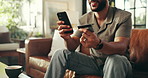 Credit card, phone and typing with hands of man on sofa for payment, fintech or online shopping. Banking app, ecommerce and purchase with closeup of person in living room at home for debit and mobile