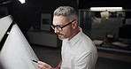Man, architect and drawing with building, whiteboard and lines with creativity, editing and night at company. Mature person, engineer and paper with writing, sketch and project management at agency
