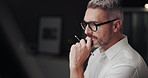 Business, drawing and night with man, thinking and architecture with industry. Evening, person and employee with ideas, illustration and deadline with problem solving, solution and decision in office