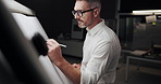 Business, drawing and night with man, deadline and architecture with industry. Evening, person and employee with ideas, illustration and construction planning with engineering, writing and process