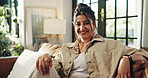 Home, sofa and face of woman for relax, comfortable and self care for mental health in living room. House, female person and portrait on couch for chilling, resting and happiness with peace in lounge