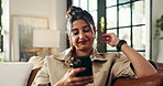 Smile, phone and relax with woman on sofa for social media, streaming or online update. Networking app, conversation and post with person and mobile in living room at home for chat and contact