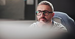 Business, thinking and man with internet, computer and planning for project, review and copywriting. Person, employee and journalist in office, pc and editing with research for article and decision