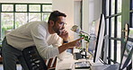 Computer, phone call and pointing with man in home office for remote work or startup business. Conversation, design and walking with freelance employee in apartment for feedback, review or update