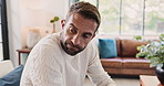 Sad, thinking and man with stress in home, reflection and worry with bankruptcy or financial crisis. Anxiety, depression and person in living room with concern for fail, mistake and mental health