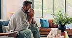 Man, blanket and blowing nose in sick home, toilet paper and couch for health fail or burnout. Pneumonia, male person and tissue for respiratory disease in living room, bacteria and hayfever allergy