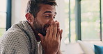 Man, blanket and blowing nose in cold home, toilet paper and couch for health fail or burnout. Pneumonia, male person and tissue for respiratory disease in living room, bacteria and hayfever allergy