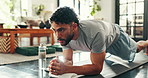Plank, fitness and man in home for exercise, workout and training for wellness, health and core strength. Morning routine, house and person on mat for muscles, challenge and balance for wellbeing