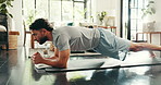 Plank, fitness and man in home for workout, exercise and training for wellness, health and core strength. Morning routine, house and person on mat for muscles, challenge and balance for wellbeing