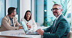 Boardroom, laptop and leadership with face of business man in office for collaboration or meeting. Computer, coworking and management with smile of mature employee in workplace for development