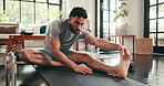 Man, fitness and stretching in home for workout, warmup exercise or training for leg muscle. Endurance, goal and athlete person for cardio, wellness and balance on floor with mat for challenge